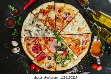Different pieces of pizza put in one big pizza on black