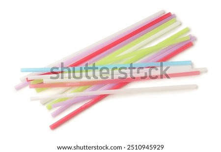 Different plastic straws on white background
