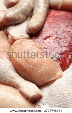 Different raw meat products as background, closeup