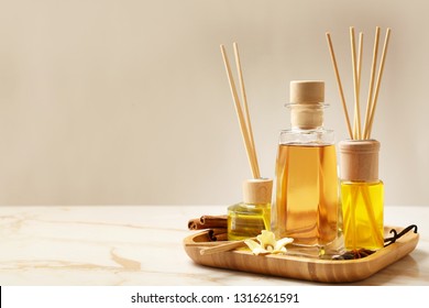 Different reed diffusers on table