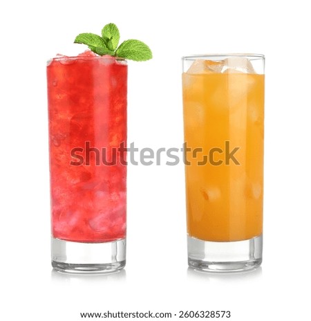 Different refreshing drinks with ice cubes isolated on white
