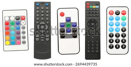 Different remote controls isolated on white, set