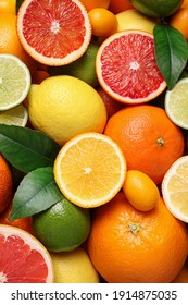 Different Ripe Citrus Fruits As Background, Closeup