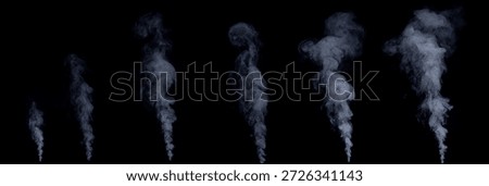 different rising smoke clouds in front of black background