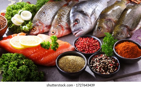 Different sorts of fish on kitchen table, - Shutterstock ID 1727643439