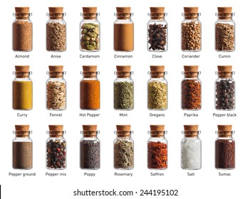 different spices in a little bottles isolated on white background - Powered by Shutterstock