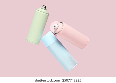 Different spray paint cans flying on pink background - Powered by Shutterstock