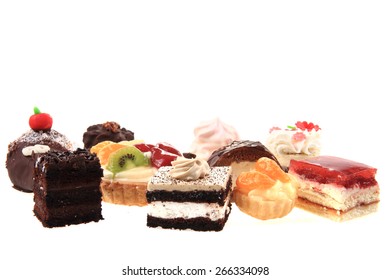 Different Sweet Deserts Isolated On The White Background