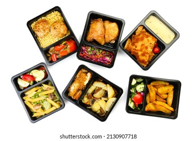 Different tasty food in lunch boxes on white background - Shutterstock ID 2130907718