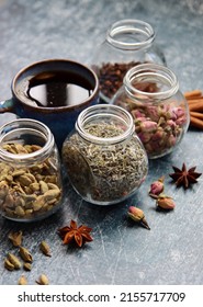 Different Tea Flavors Top View Photo. Cinnamon, Anise, Cardamom, Clove, Lavender, Roses On A Table. Aromatic Tea Close Up. Natural Antioxidant Concept. 