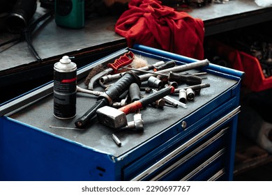 Different tools on workbench in car service