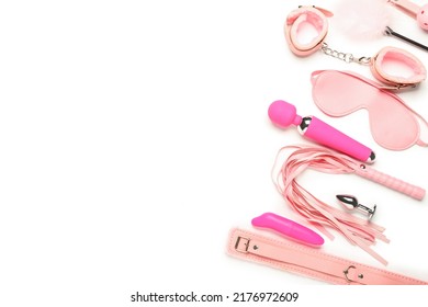 Different toys from sex shop on white background