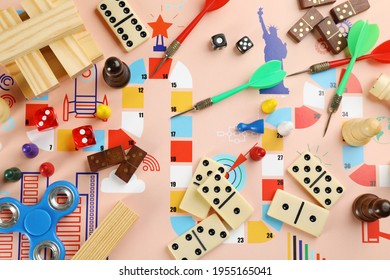 Different types of board games and its' components as background, top view