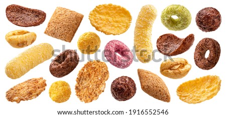 Different types of breakfast cereals isolated on white background, sweet cornflakes, chocolate pads and rings, puffed rice and wholegrain flakes collection