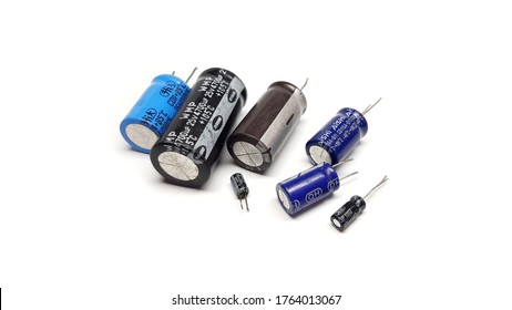 Different Types of Capacitors Isolated on White Background