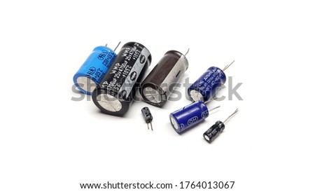 Different Types of Capacitors Isolated on White Background