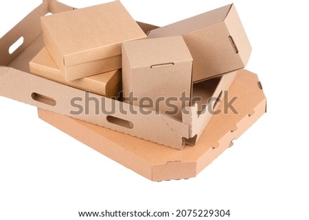 Different types of cardboard boxes isolated on white. Carton boxes for storaging fruits or other goods, gift boxes, pizza box for your presentation or website. Sustainable packaging concept