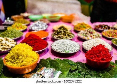 different types of colorful garnish pan masala used to decorate betel leaf banarasi paan.