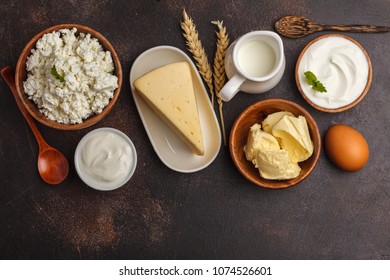 Different Types Of Dairy Products On Dark Background
