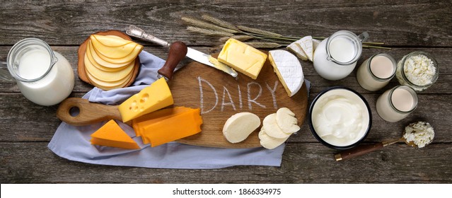 Different Types Of Fresh Dairy Products On Wooden Background. Top View, Panorama, Banner