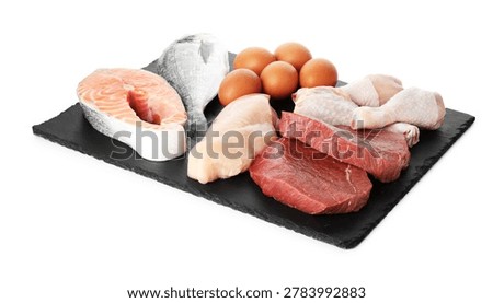 Different types of fresh raw meat, fish and eggs isolated on white