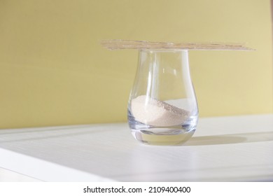 Different Types Of Gelatin Powder And Sheets On White Table.