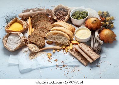 Different Types Of High Carbohydrate Food. Selection Of Good Sources Of Carbs On Grey Background. 