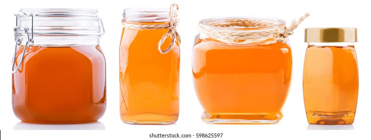 Different types of honey and honey bottles.
Isolated on white background.