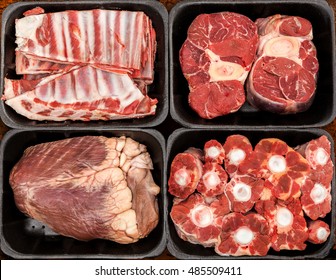Different types of meat in plastic boxes packaging tray. - Shutterstock ID 485509411
