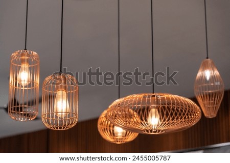 Different types of shape pendants light hanging on the ceiling