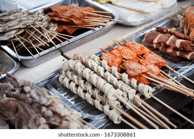 Different Types Of Skewers With Meat, Bread And Fish On A Street Market In The Anhui Province Of Central China