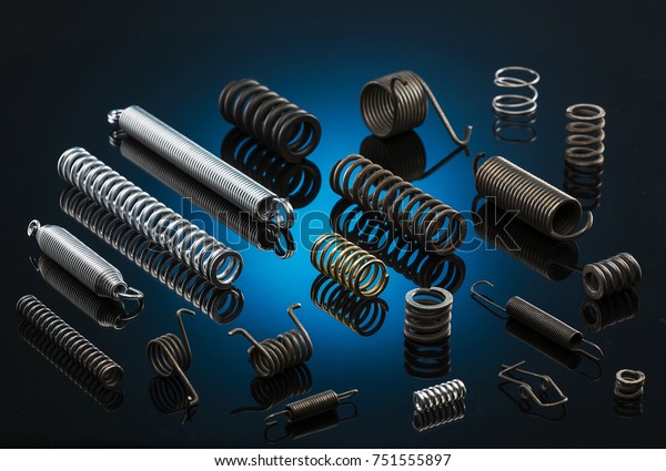 different types of springs or coil springs on\
blue backgrounds