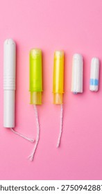 Different types of tampons shown in a row with bright backgrounds