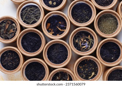 Different types of tea in a pepper boxes.