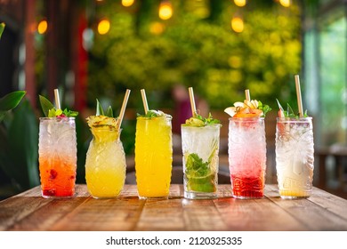 different types of tropical cocktails, summer style tiki bar drinks