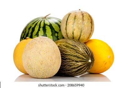 Different varieties of melons mirrored and isolated on white Background