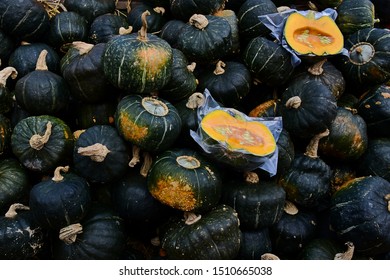 Different varieties squashes and pumpkins .