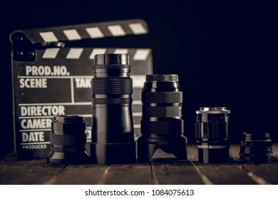 Different Video Making Equipment On Brown Wooden Table With Copy Space. Indie Movie Production Essentials