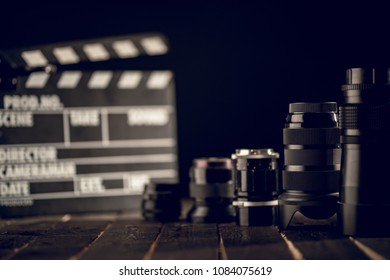 Different Video Making Equipment On Brown Wooden Table With Copy Space. Indie Movie Production Essentials