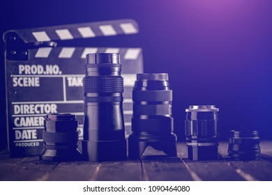 Different Video Making Equipment On Brown Wooden Table With Copy Space. Indie Movie Production Essentials