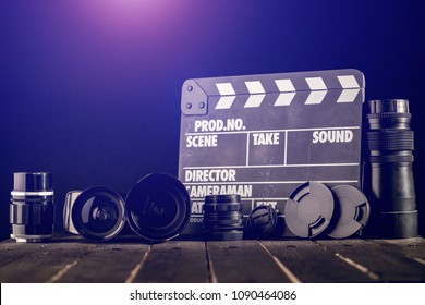 Different Video Making Equipment On Brown Wooden Table With Copy Space. Indie Movie Production Essentials