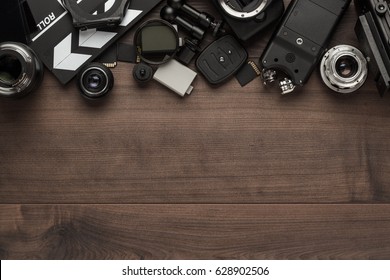 Different Video Making Equipment On Brown Wooden Table With Copy Space. Indie Movie Production Essentials