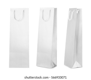 Different views of paper bag for wine bottle on white background - Powered by Shutterstock