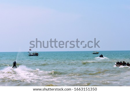 Different water activities in the ocean in goa