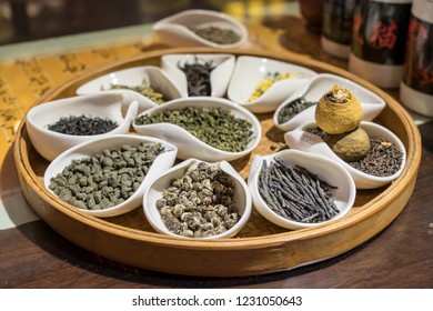 Different white, black, green and oolong teas in traditional tea ceremony in China - Shutterstock ID 1231050643