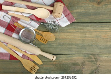 different wooden kitchen tools on the table with copy space - Shutterstock ID 289256552