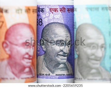Differentially focused Indian currency notes of different denominations. Growing Indian economy.