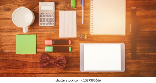 A differetns objects for working on wooden table