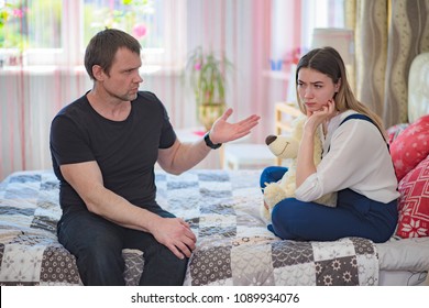 A Difficult Conversation With The Daughter Of A Teenager With His Father. They Sit Right In Front Of The Camera And Talk And Look Unhappy