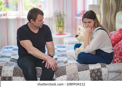 A Difficult Conversation With The Daughter Of A Teenager With His Father. They Sit Right In Front Of The Camera And Talk And Look Unhappy